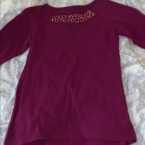 Plain burgundy top with fancy beading on top
